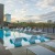 a pool with chairs around it